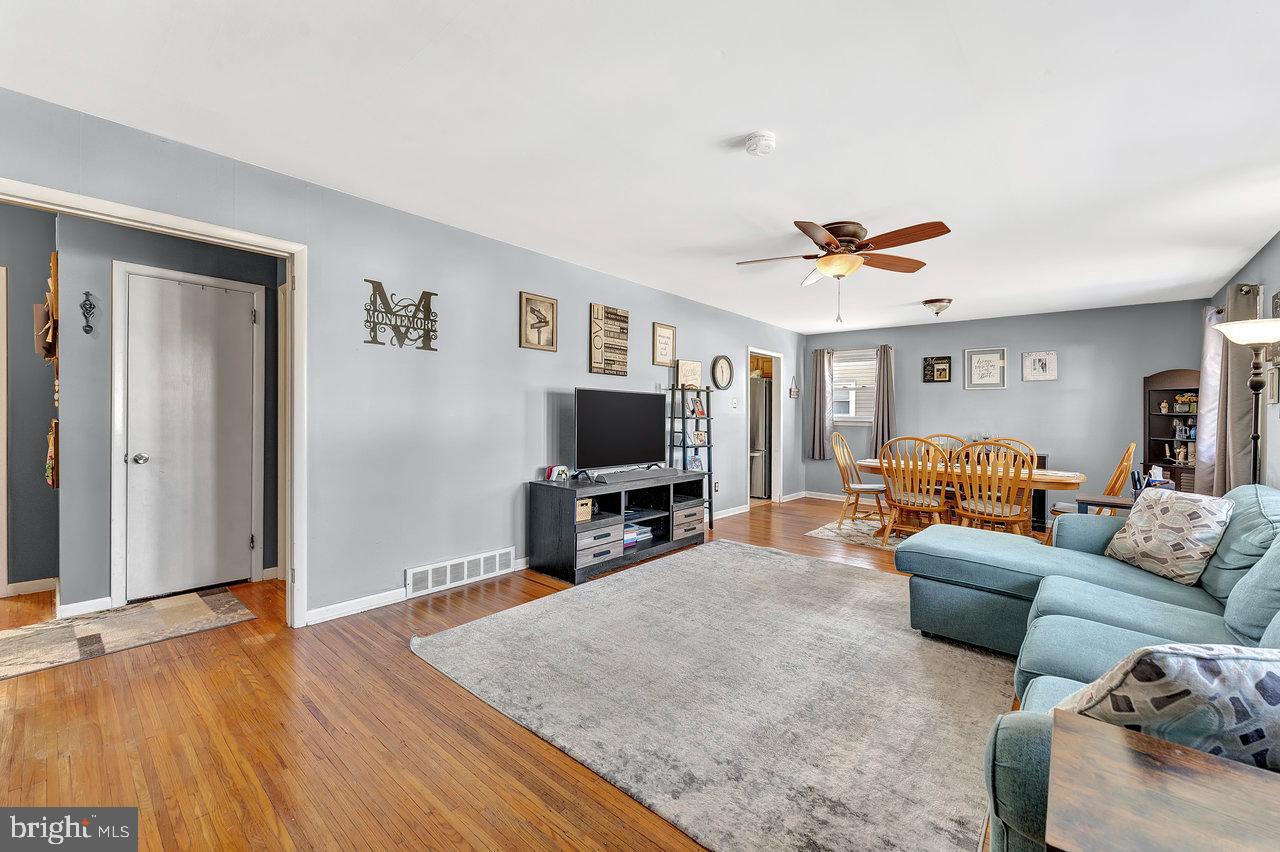 504 Jefferson Street Riverside, NJ 08075 - Photo 7 of 25 a living room with furniture and a flat screen tv
