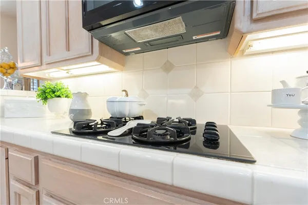 a bathroom with a sink and vanity