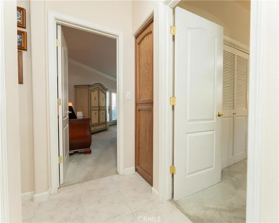 a living room with furniture and windows