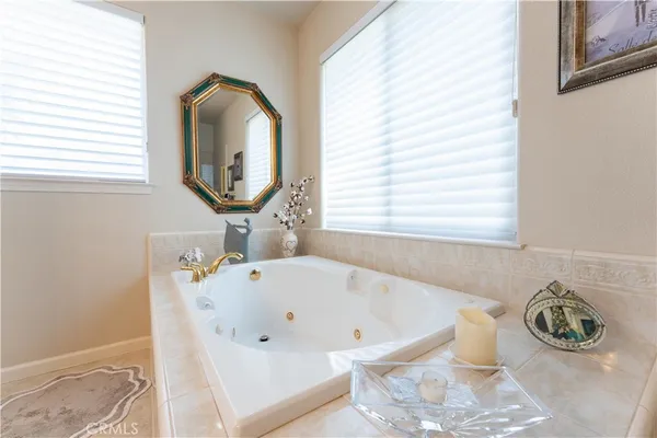 a bedroom with furniture and fireplace