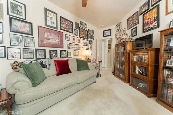 a utility room with cabinets washer and dryer