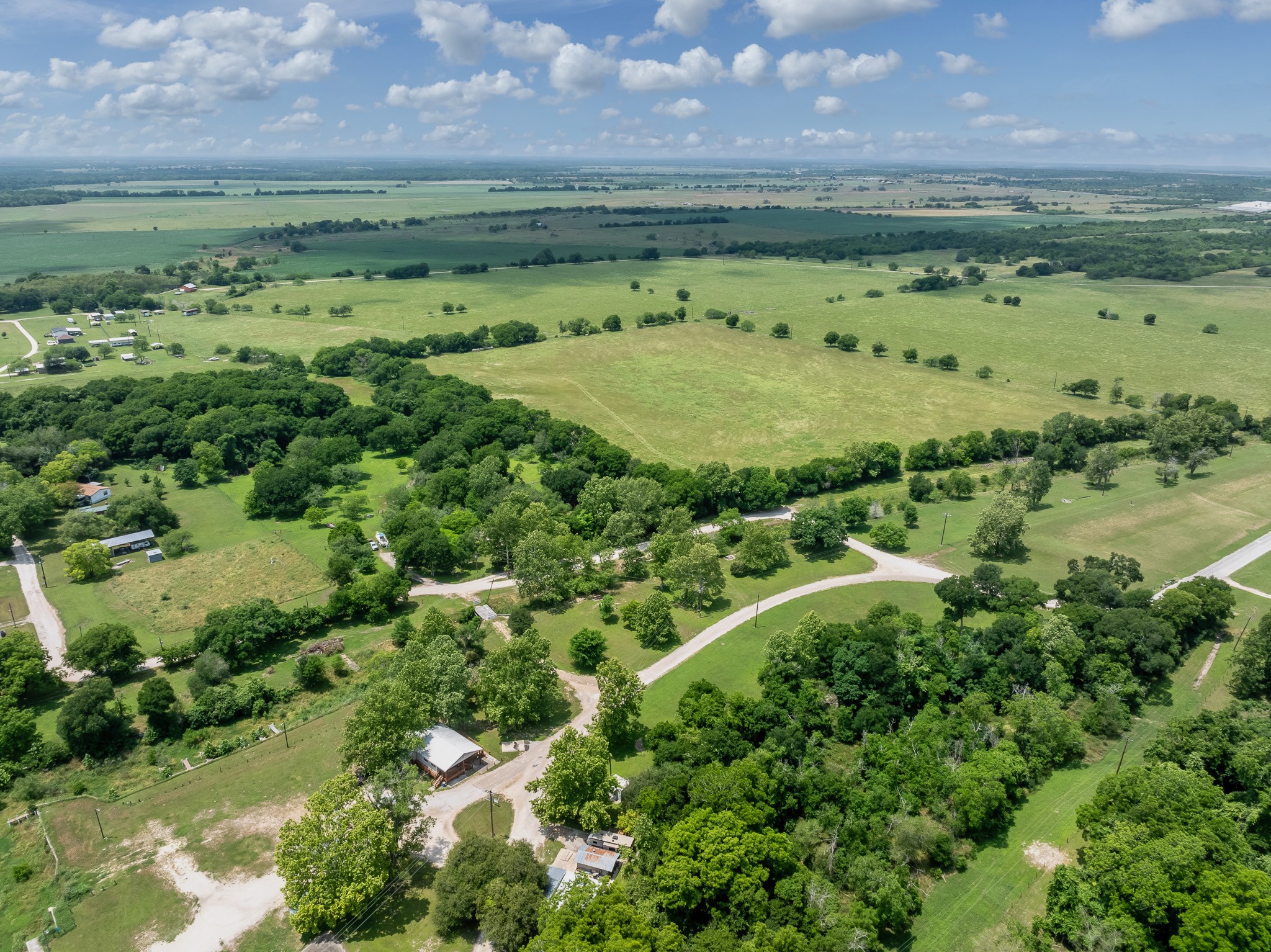 2091 Goodwin Road Gonzales, TX 78629 - Photo 22 of 23 a view of a lush green field
