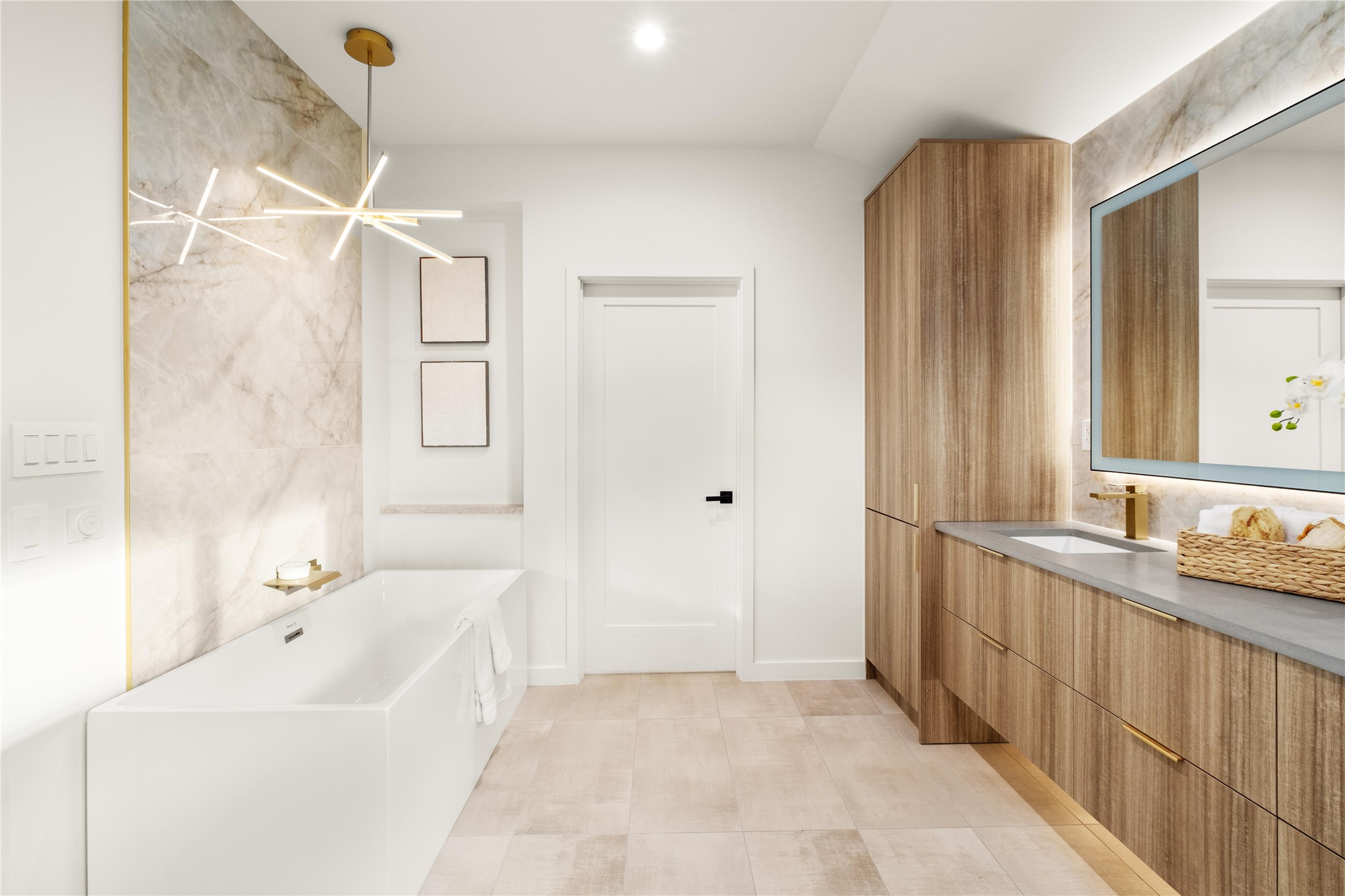 620 Bermuda Street Lakeway, TX 78734 - Photo 16 of 36 Bathroom featuring a free standing tub and vanity