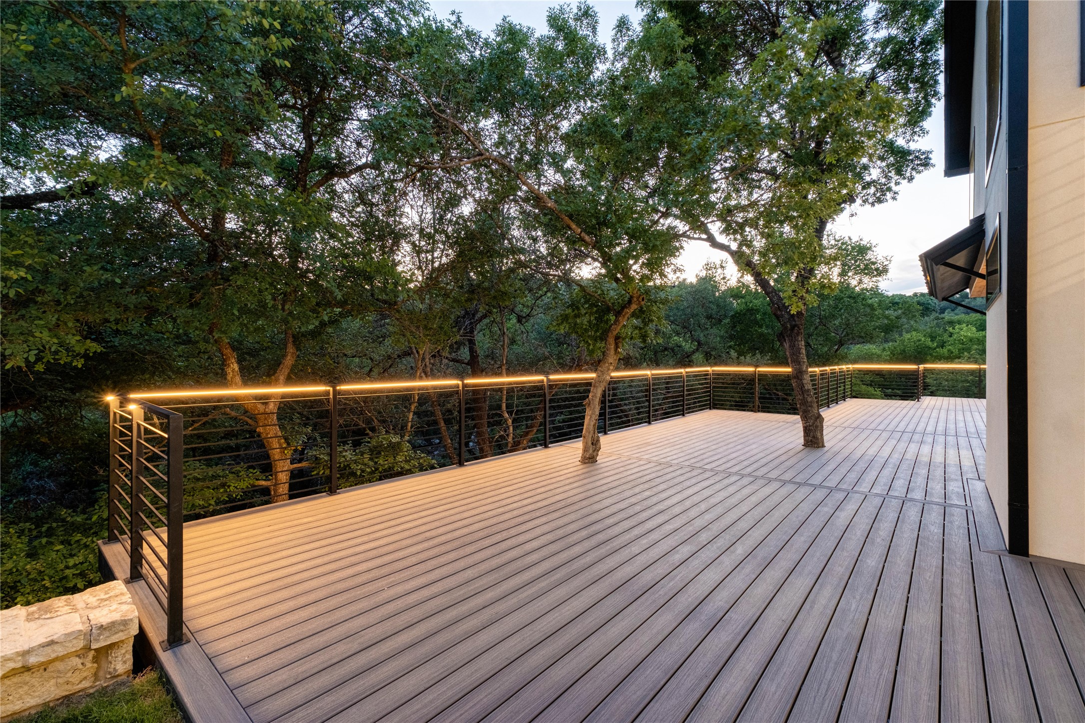 620 Bermuda Street Lakeway, TX 78734 - Photo 21 of 40 a view of a balcony with wooden floor and fence