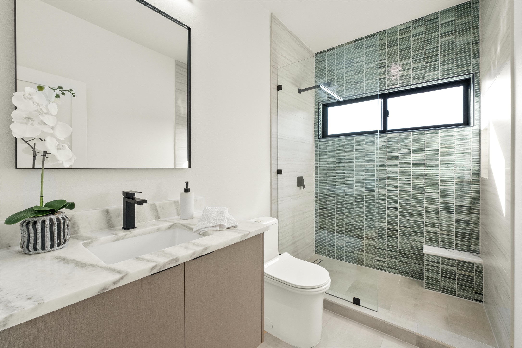 620 Bermuda Street Lakeway, TX 78734 - Photo 27 of 40 a bathroom with a granite countertop sink a toilet and shower