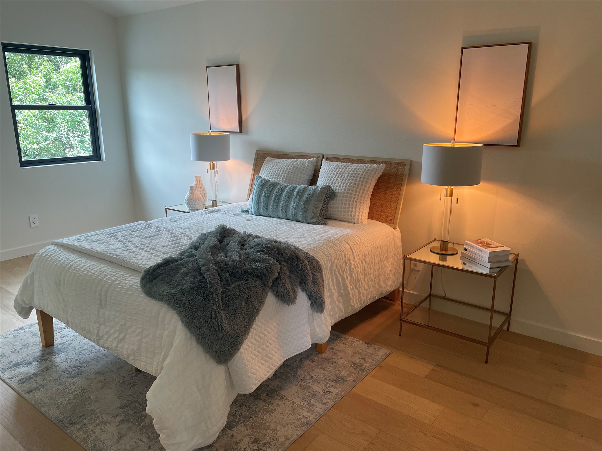 620 Bermuda Street Lakeway, TX 78734 - Photo 28 of 40 a bedroom with a bed and lamp