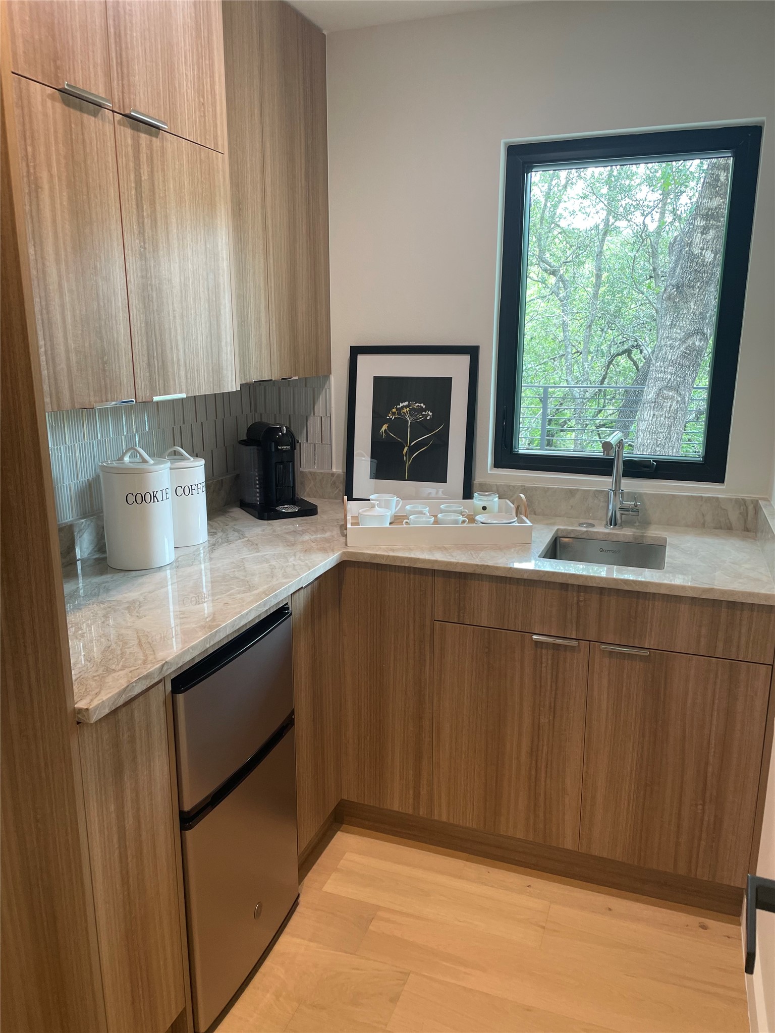620 Bermuda Street Lakeway, TX 78734 - Photo 30 of 40 a bathroom with a granite countertop sink and a large mirror