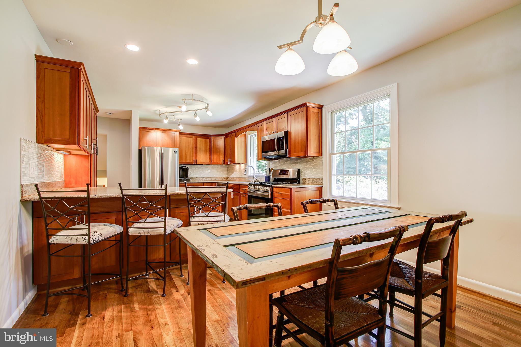 8403 Riverside Road Alexandria, VA 22308 - Photo 16 of 52 Open-Kitchen Concept with Separate Dining Room