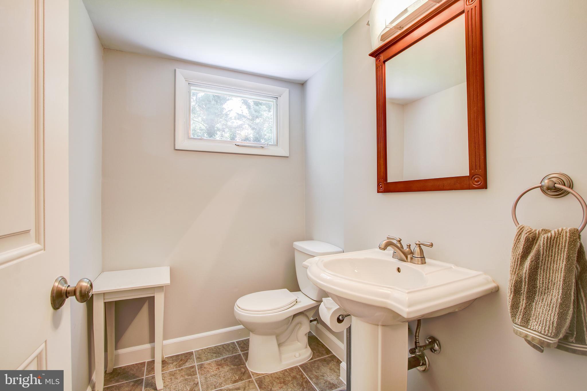 8403 Riverside Road Alexandria, VA 22308 - Photo 22 of 52 Convenient Half Bath Off Family Room - Renovated