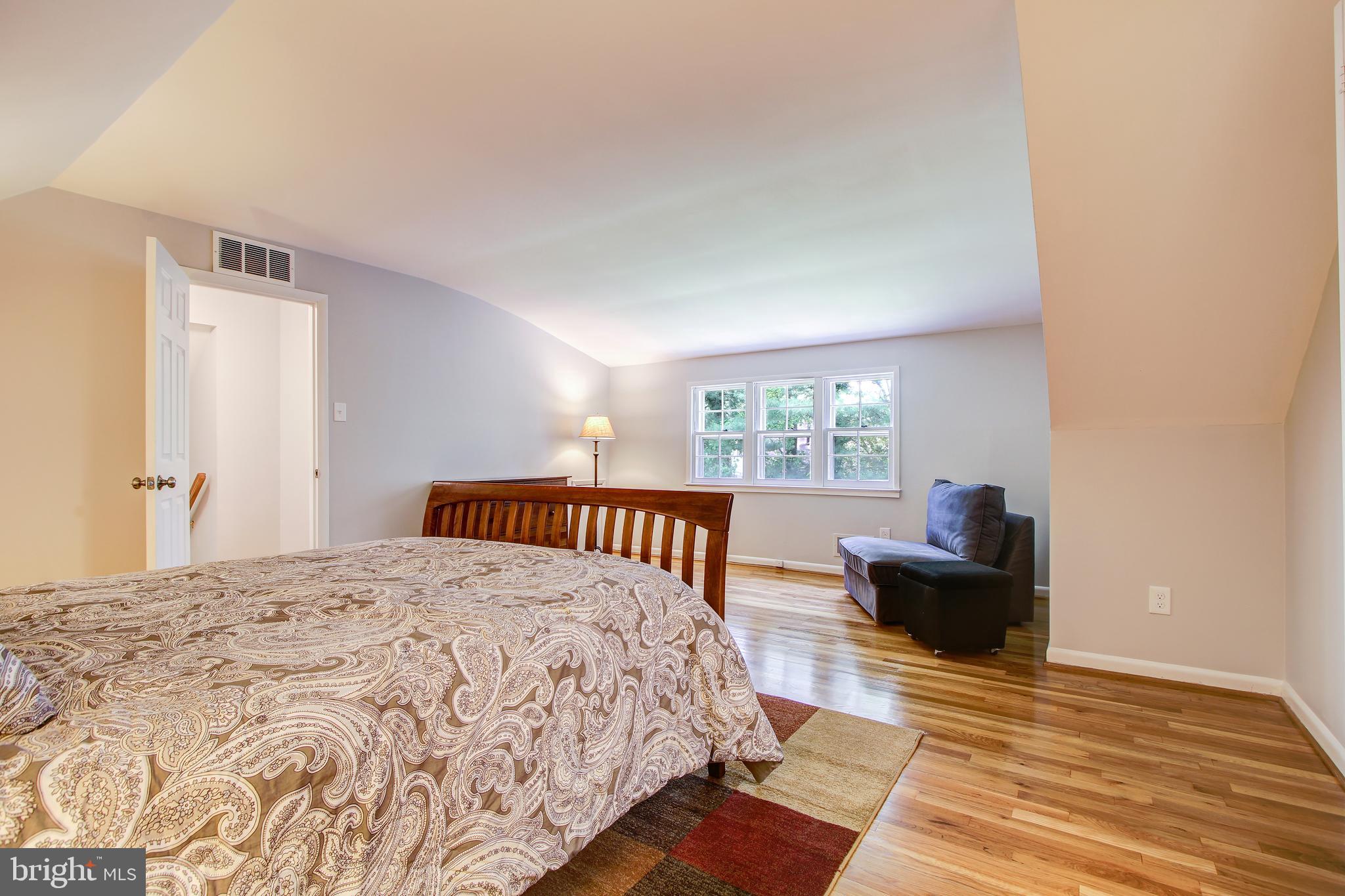 8403 Riverside Road Alexandria, VA 22308 - Photo 34 of 52 Master Bedroom with Sitting Area