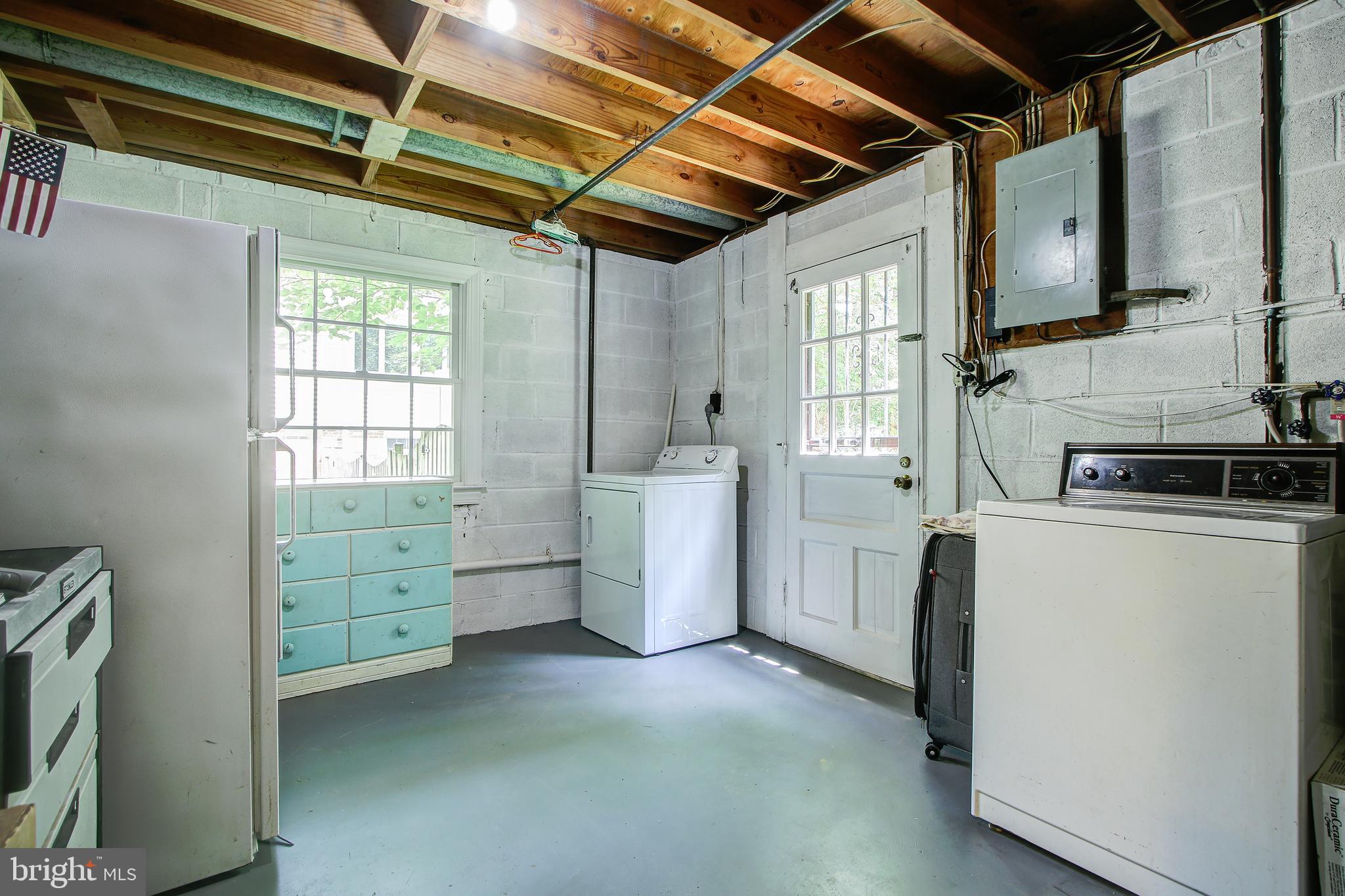 8403 Riverside Road Alexandria, VA 22308 - Photo 40 of 52 Laundry/Utility Room with Access to Back Yard