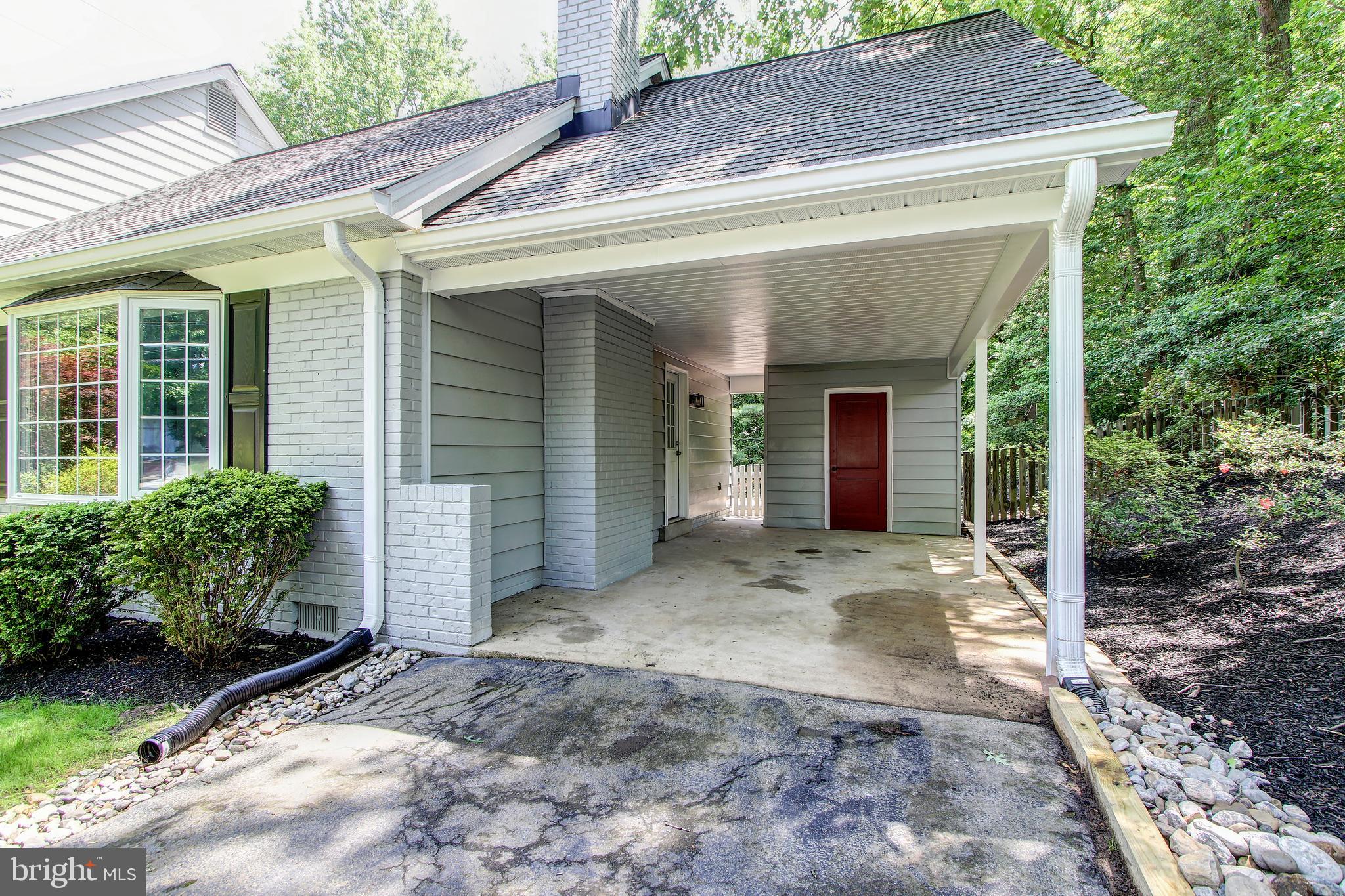 8403 Riverside Road Alexandria, VA 22308 - Photo 47 of 52 Carport and Driveway with More Than Ample Parking