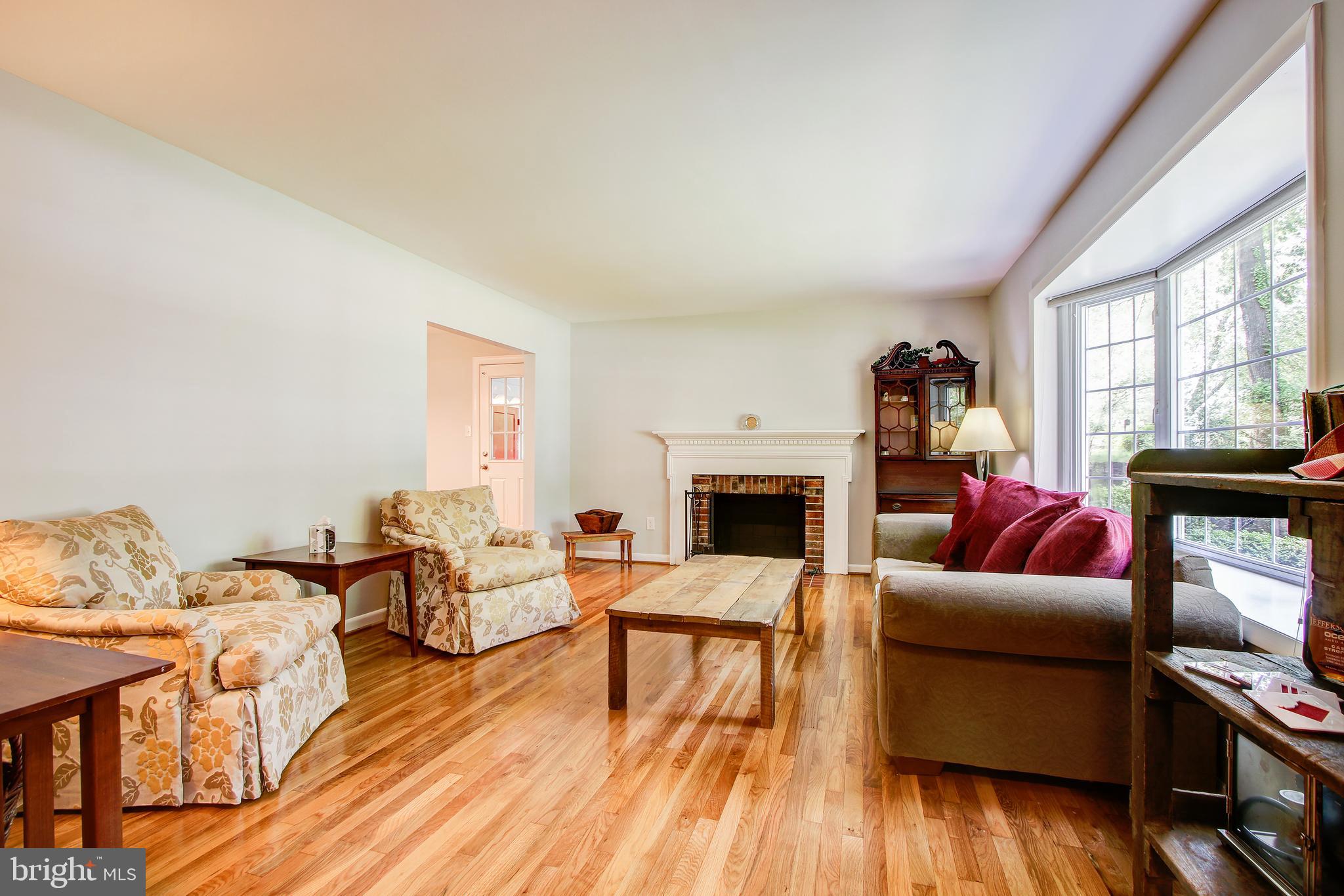 8403 Riverside Road Alexandria, VA 22308 - Photo 7 of 52 Living Room with Wood Burning Fireplace