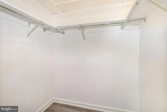 a view of a room with racks on the wall