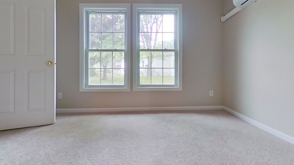 4 Juniper Circle Rockland, MA 02370 - Photo 3 of 11 an empty room with a window