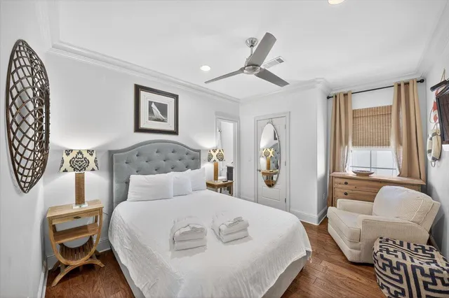 a bedroom with a large bed and a couch