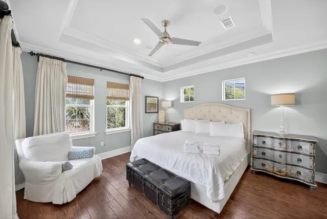 a bedroom with a bed and a couch