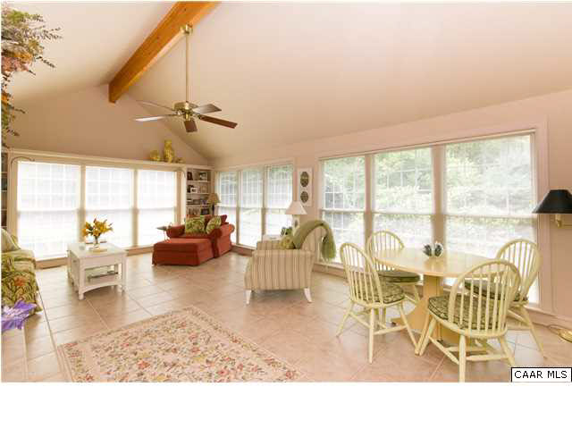 653 Broken Island Road Palmyra, VA 22963 - Photo 13 of 42 Quiet Solitude describes Home's Lovely Four-Seasons Room - Tiled, FP, Bright & Open