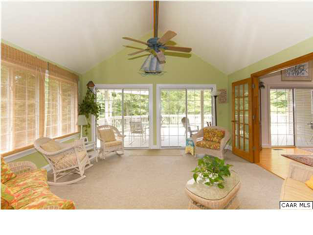 653 Broken Island Road Palmyra, VA 22963 - Photo 16 of 42 Sunroom with Walk-out to Sprawling Deck