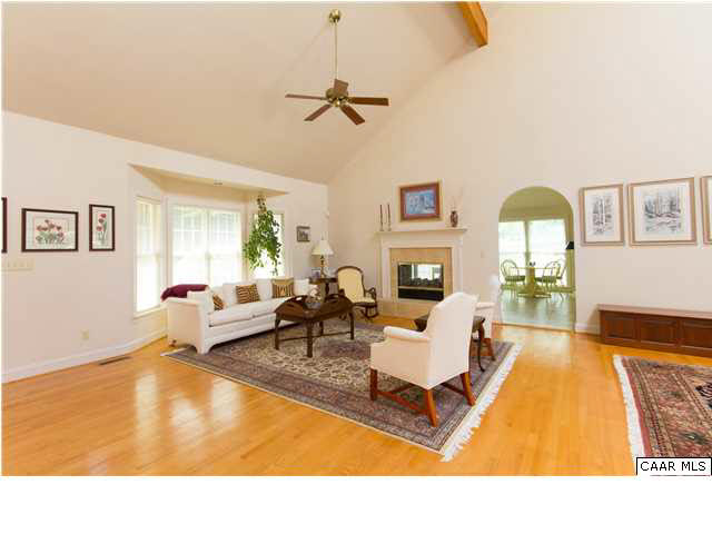 653 Broken Island Road Palmyra, VA 22963 - Photo 3 of 42 Greatroom Area with View-Through Fireplace - Large Bay Window