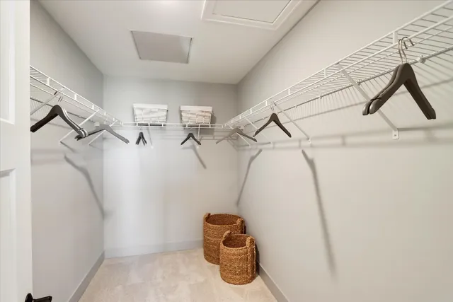 a view of entryway with racks on the wall