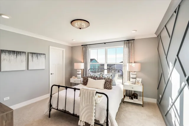 a bedroom with furniture and a window