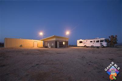 7671 Quartz Road Mojave, CA 93501 - Photo 6 of 10 a view of a house with a yard