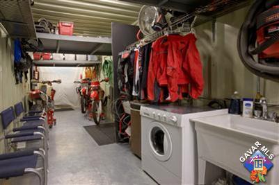 7671 Quartz Road Mojave, CA 93501 - Photo 7 of 10 a view of walk in closet with clothes and shoes