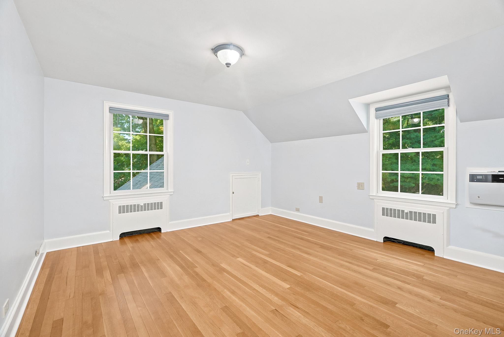 1 Sheridan Road Scarsdale, NY 10583 - Photo 26 of 40 Generously sized second floor bedroom showing two exposures