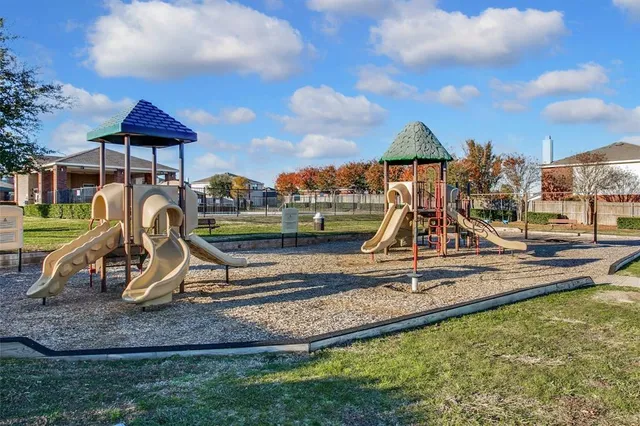 a view of a swimming pool and an outdoor space