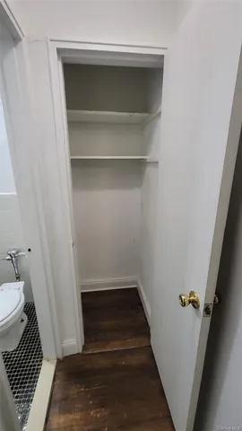 a bathroom with a sink and toilet