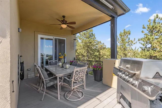 a view of an outside dining space with furniture