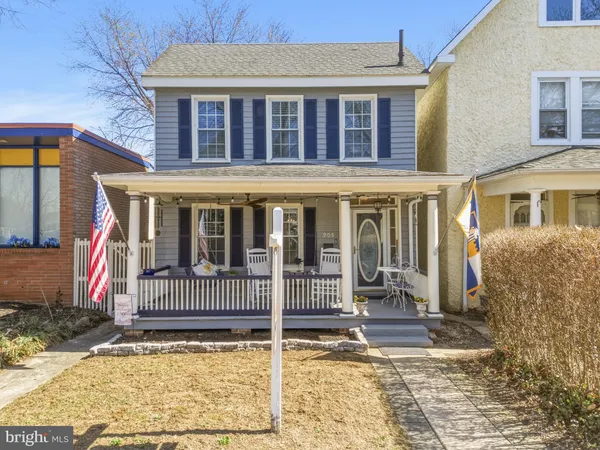 a view of a chairs and table in a patio