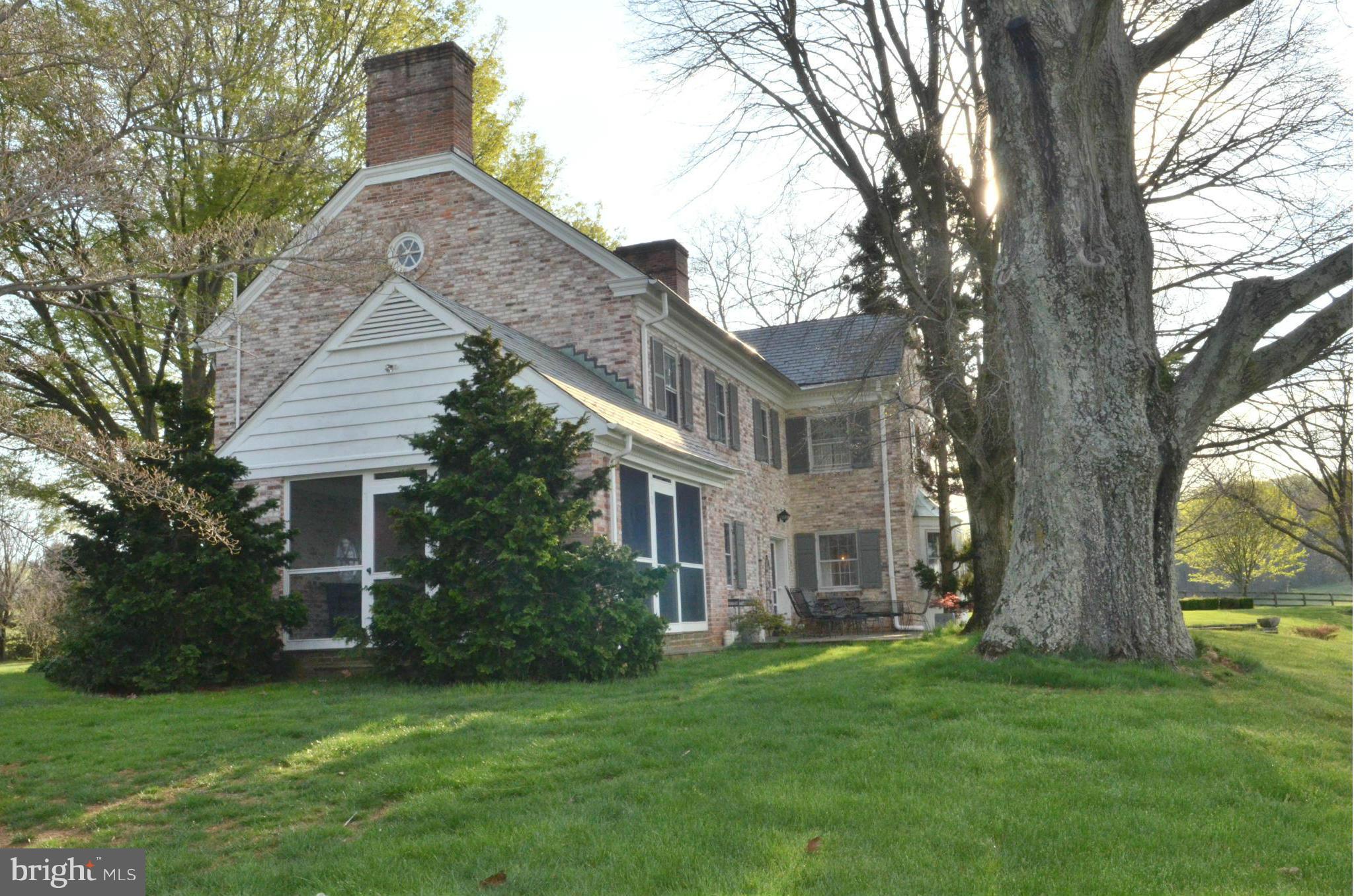 3321 Butler Road Glyndon, MD 21136 - Photo 22 of 28 Main house with large screened in porch
