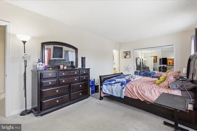 a view of a backyard with sitting area