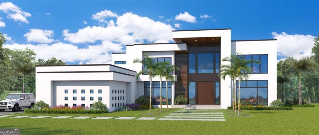 6711 Bishop Road Fairburn, GA 30213 - Photo 2 of 7 a front view of a house with garden