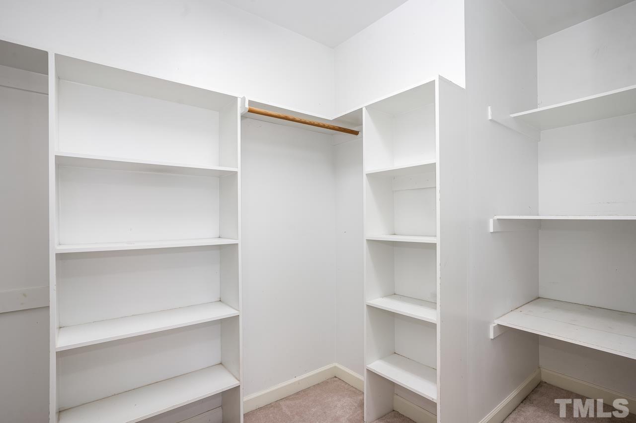 6336 Nowell Pointe Drive Raleigh, NC 27607 - Photo 22 of 25 a view of an empty walk in closet