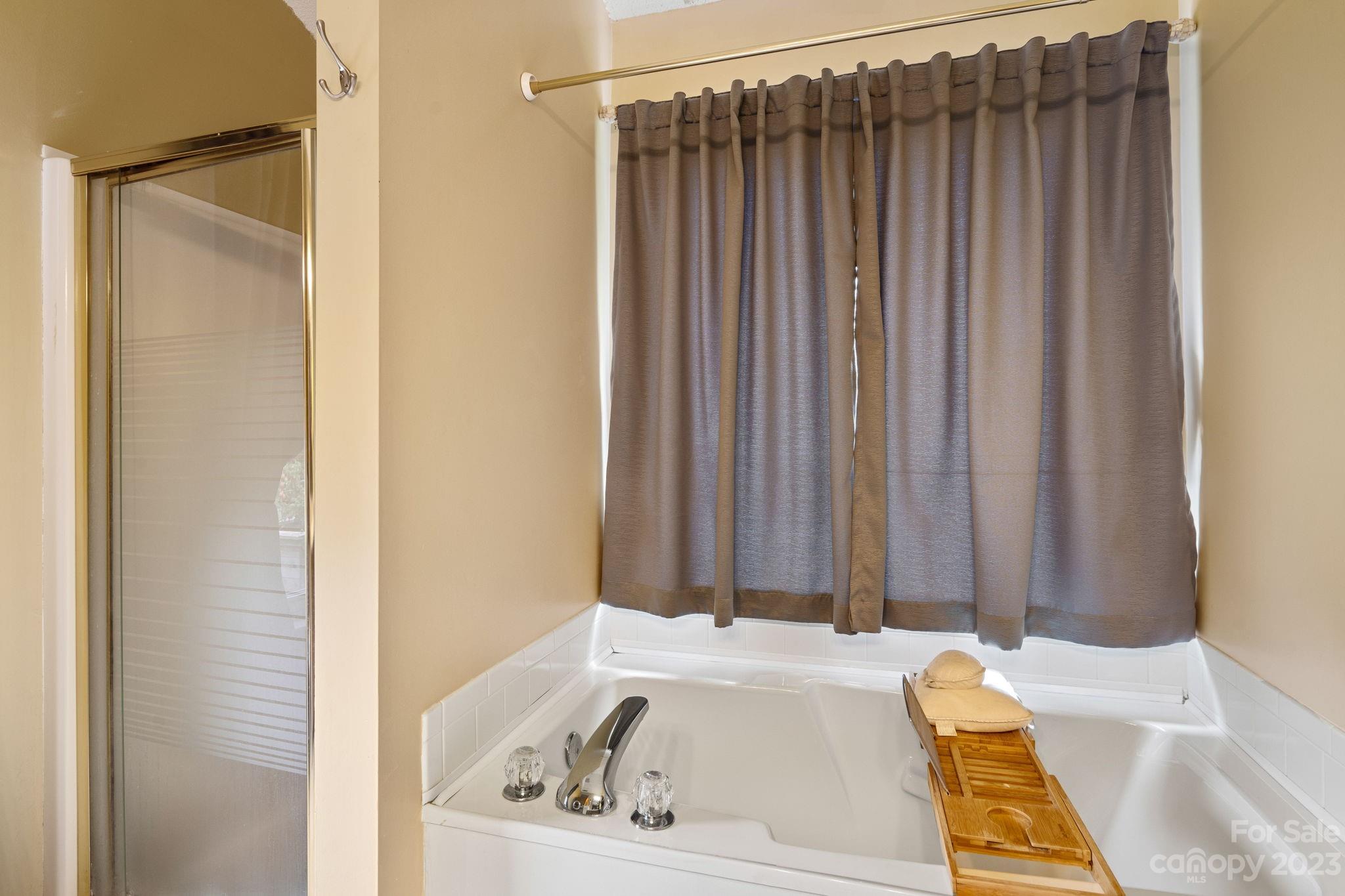 3691 Slanting Bridge Road Sherrills Ford, NC 28673 - Photo 15 of 33 a bath tub sitting in a bathroom sink