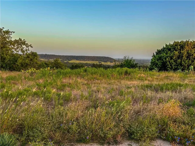 a view of a lake with a city