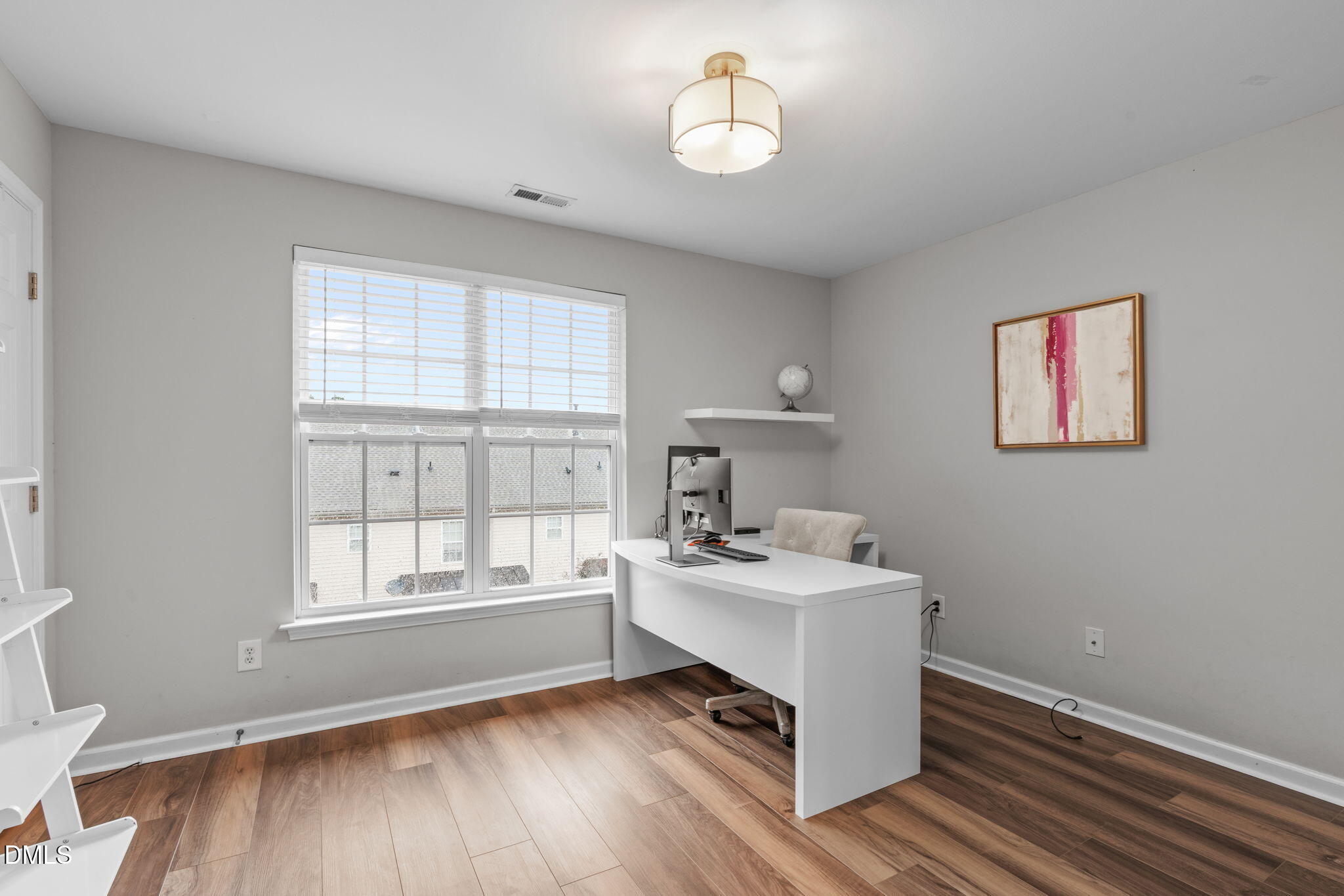 9909 Grettle Court Raleigh, NC 27617 - Photo 17 of 23 a living room with furniture and a window