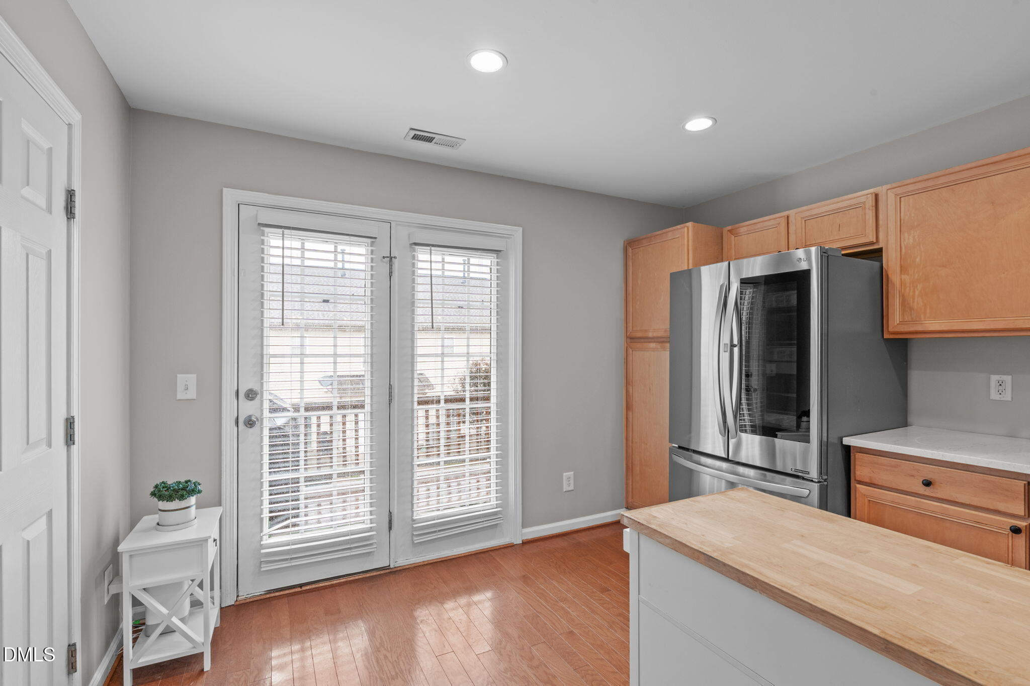 9909 Grettle Court Raleigh, NC 27617 - Photo 9 of 23 a view of livingroom with furniture and wooden floor