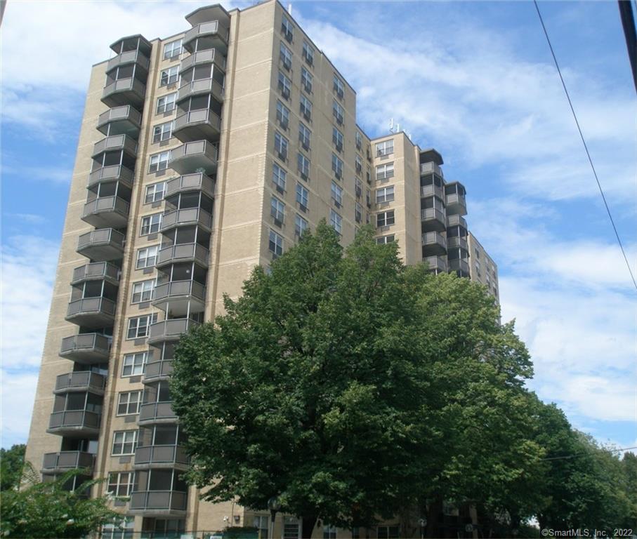 50 Glenbrook Road, Unit 12F Stamford, CT 06902 - Photo 1 of 1 a city view with tall building