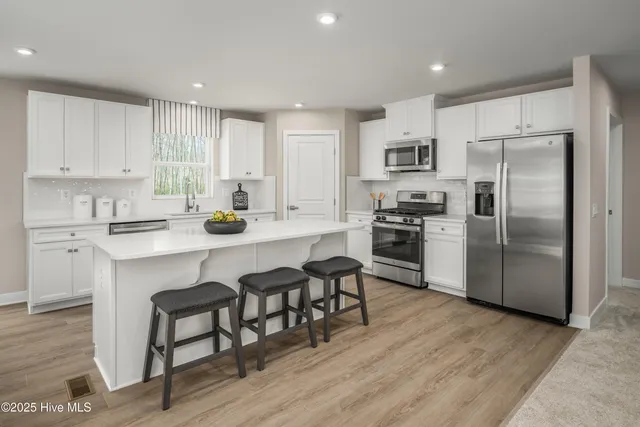 $349,990 | 4077 Farmfield Drive, Navassa, NC 28451