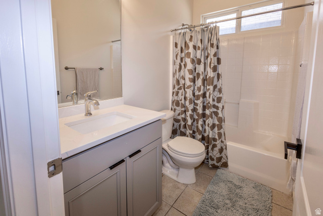 11751 Lake Run Road South Jordan, UT 84009 - Photo 21 of 38 Bathroom featuring a single vanity with light-colored countertop, an integrated sink, and brushed nickel faucet
