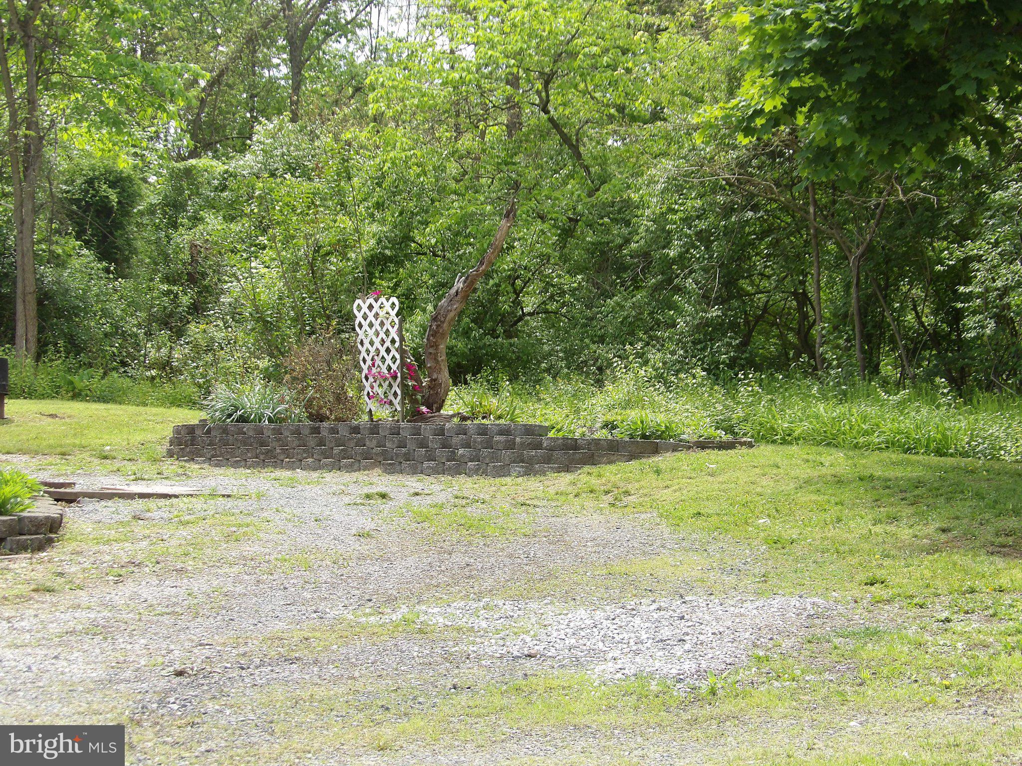 1045 Lockport Road Lewistown, PA 17044 - Photo 40 of 51 Serene garden retreat in nature.