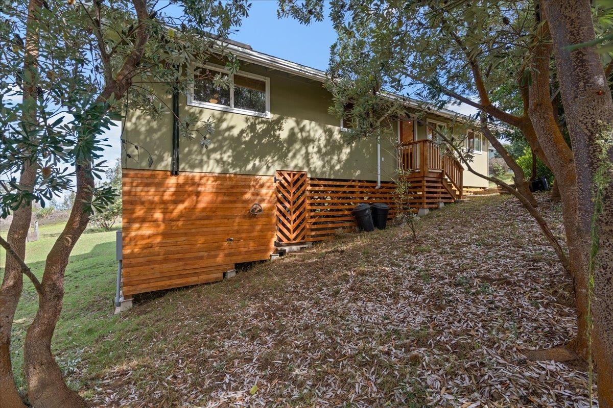 31 Hapapa Road, Unit B Kula, HI 96790 - Photo 46 of 50 front view of a house with a yard