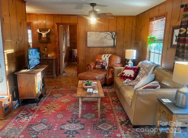 a view of a park with iron fence