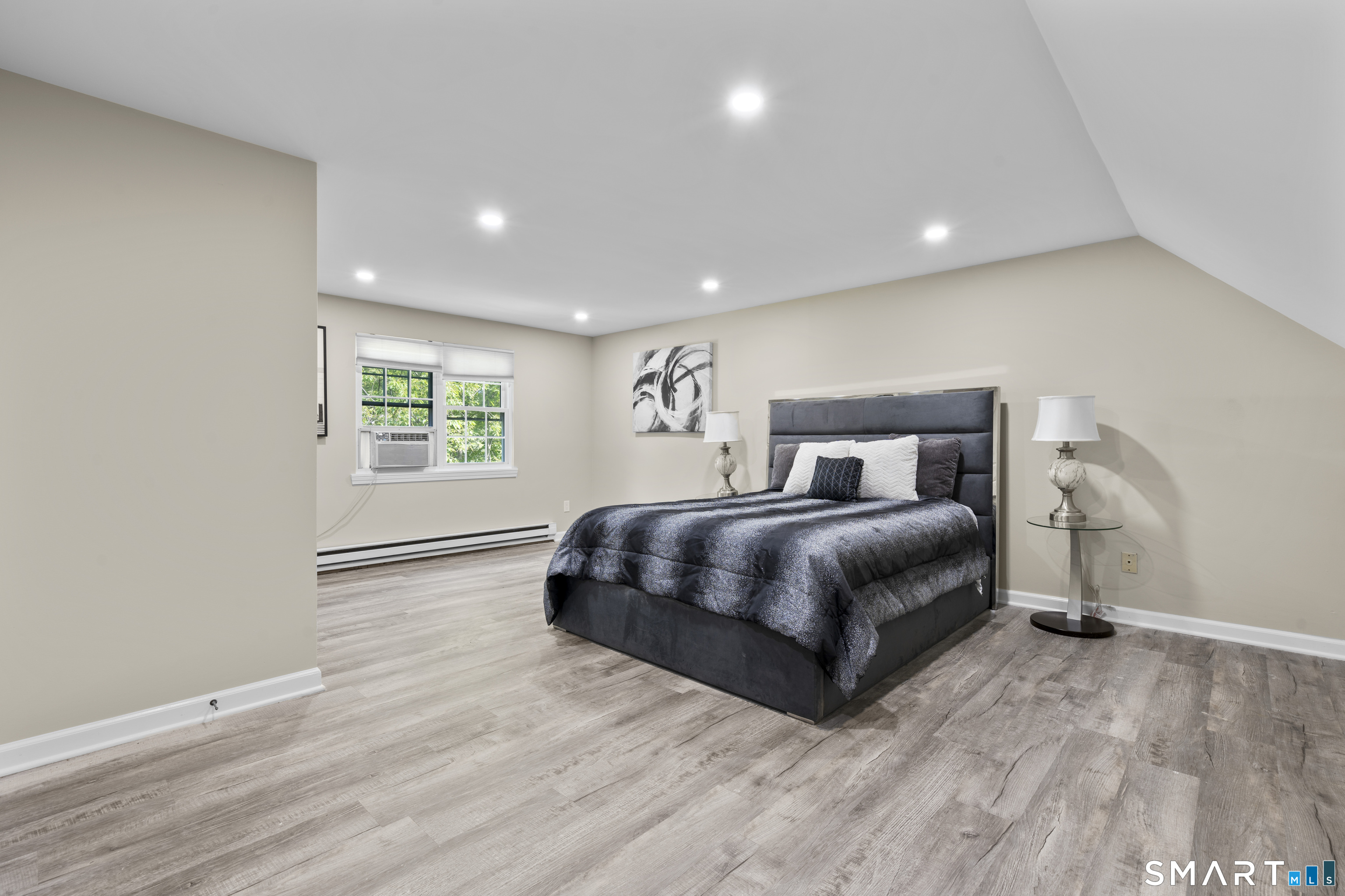 13 Williams Court Wolcott, CT 06716 - Photo 15 of 33 a bedroom with a large bed and a window