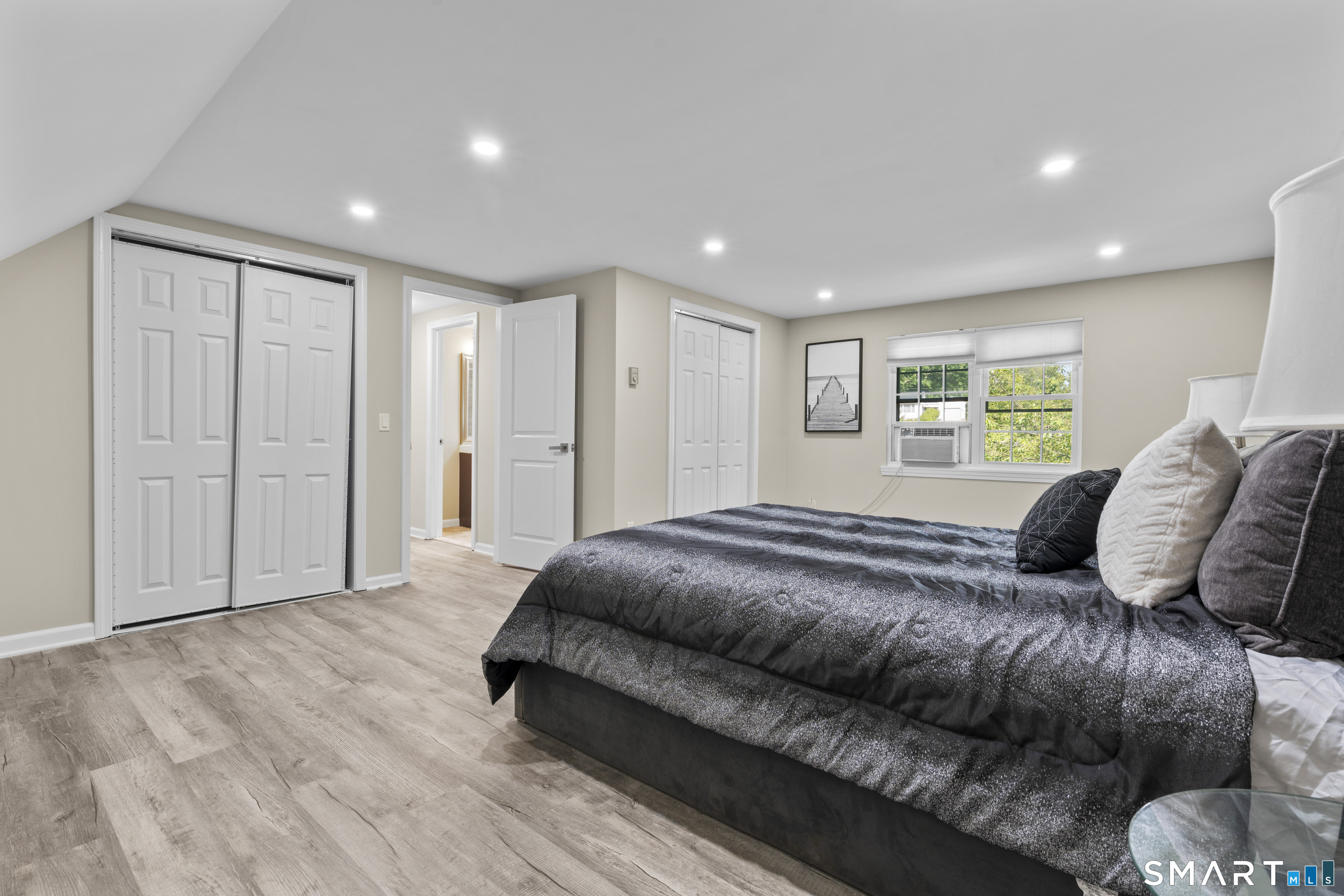 13 Williams Court Wolcott, CT 06716 - Photo 16 of 33 a spacious bedroom with a bed and a window