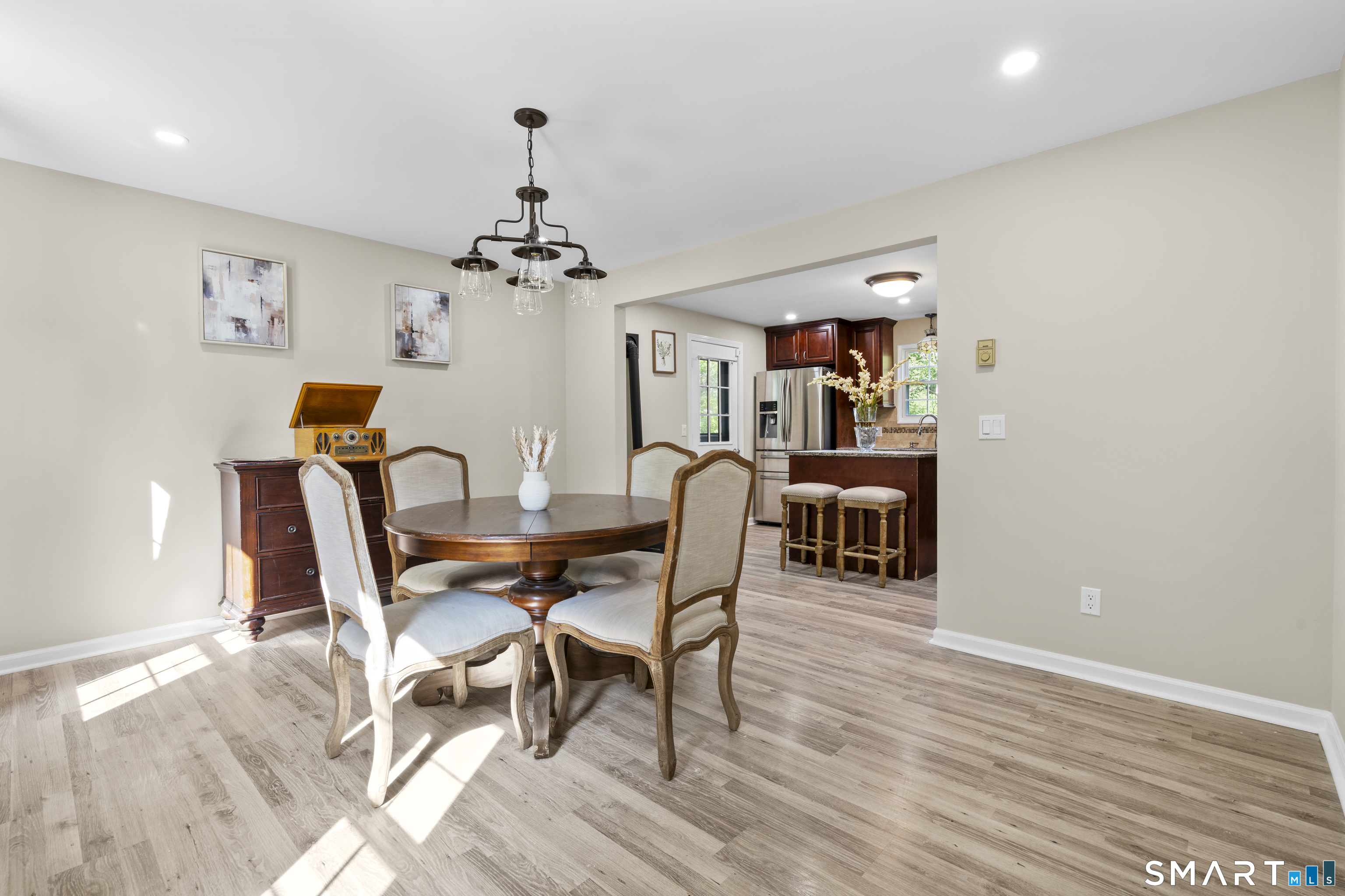 13 Williams Court Wolcott, CT 06716 - Photo 9 of 33 a dining room with furniture and wooden floor